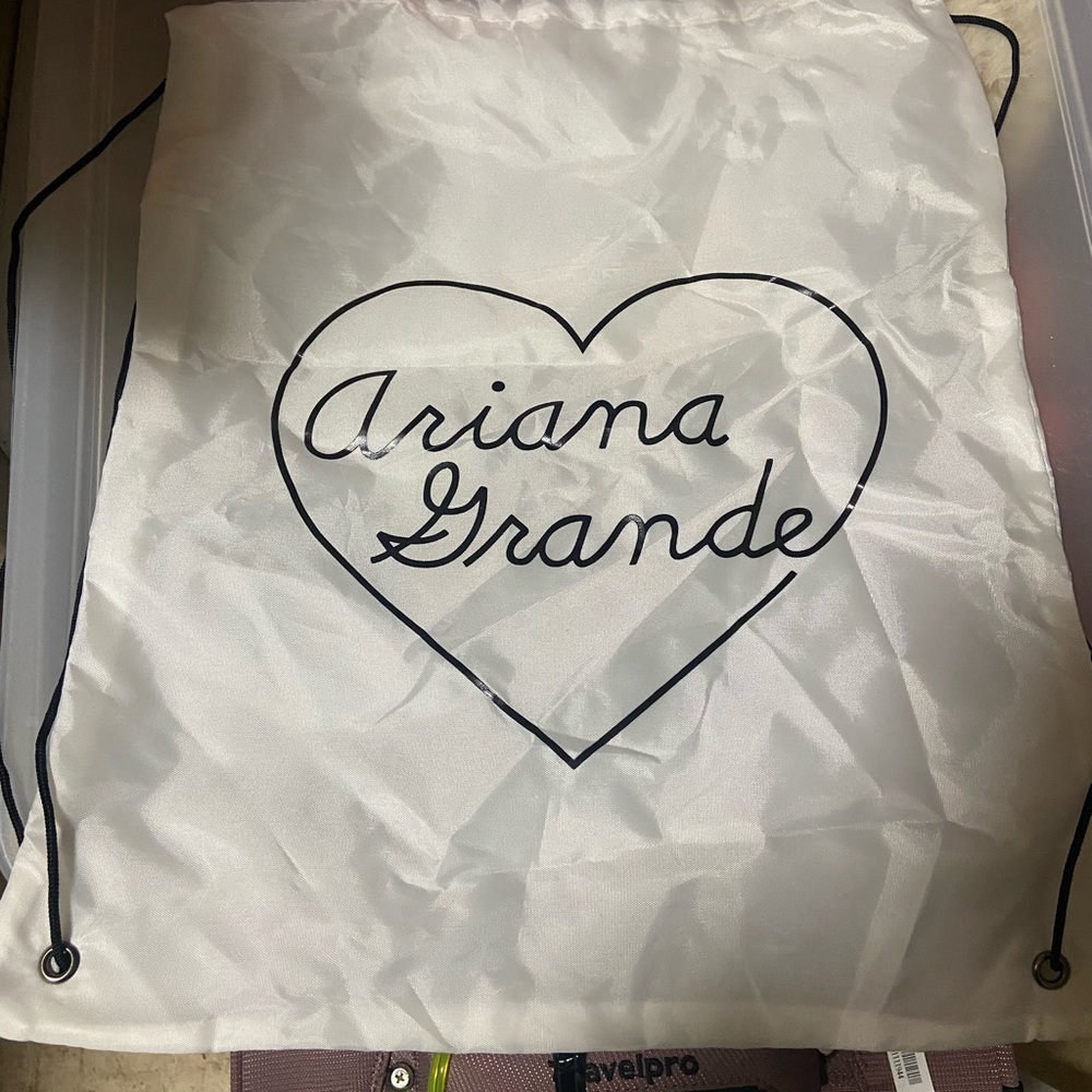 Ariana Grande cinches knapsack bag